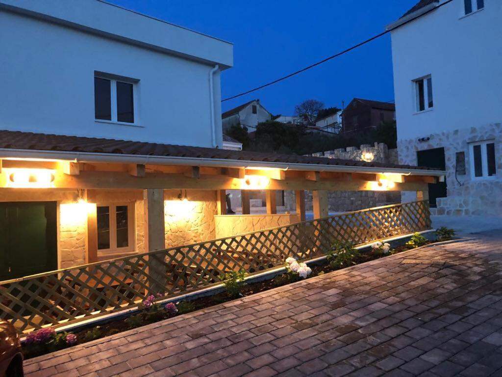 Lit terrace of Villa Trau d`oro in the evening